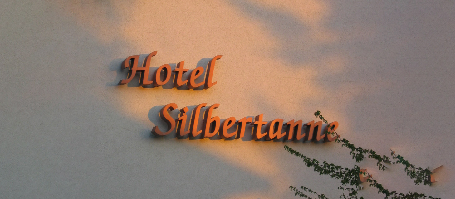 Schriftzug_mit_Sonnenuntergang_wide